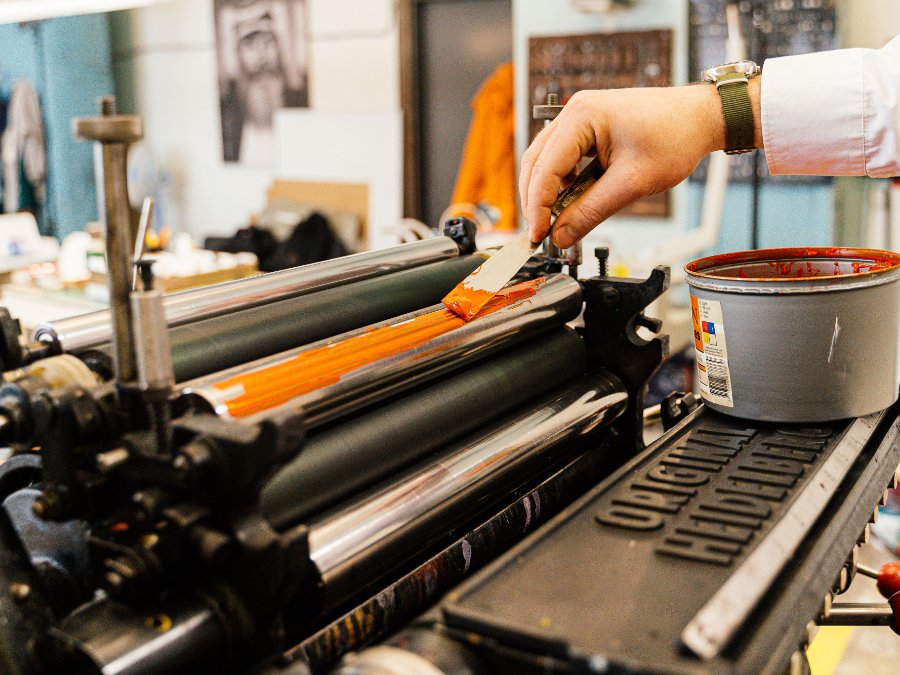 Ink being drawn across a press roller